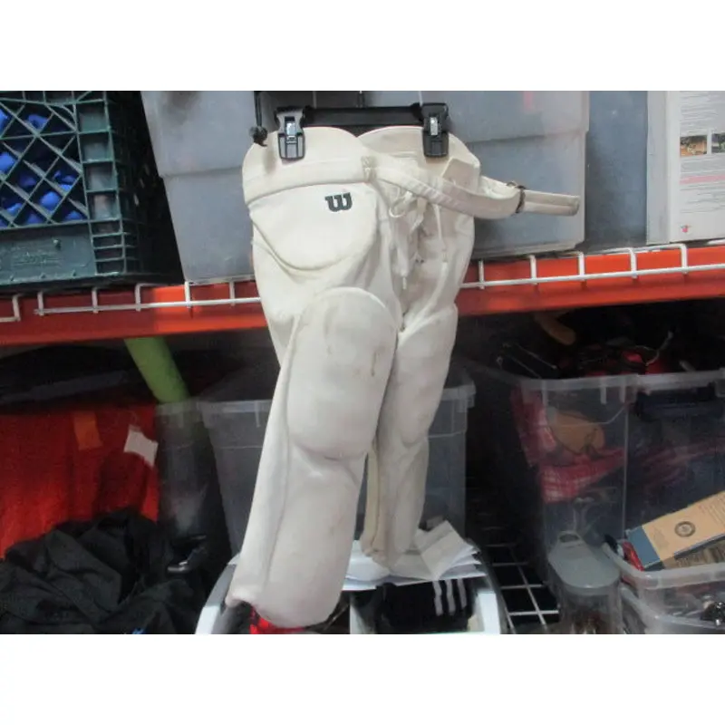 Used Wilson White Football Pants w/ Pads Size XS